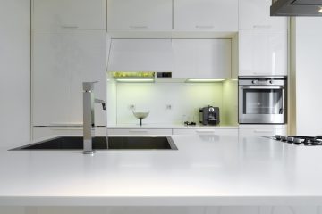 White Kitchen - Cleaning Countertops