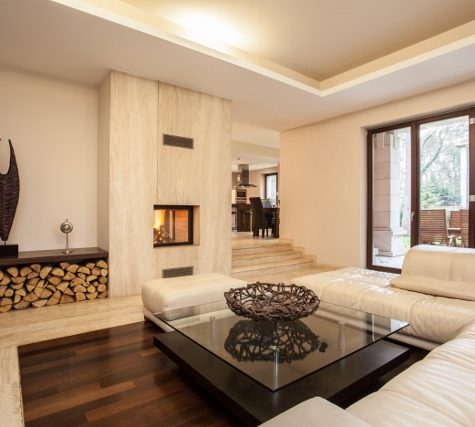 Stone tile and wood floor in living room